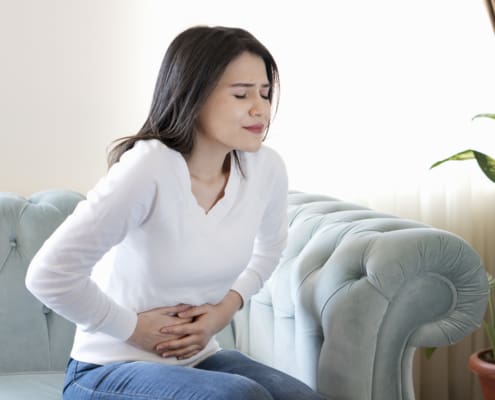 Young Woman With Stomach Pain
