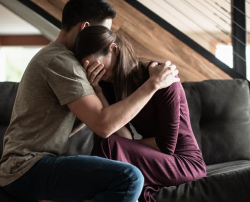 Husband Comforting His Wife.