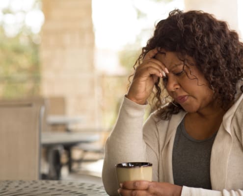 African American Middle Age Woman Looking Sad.