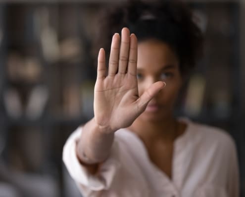 Serious African American Woman Protesting Against Bullying.